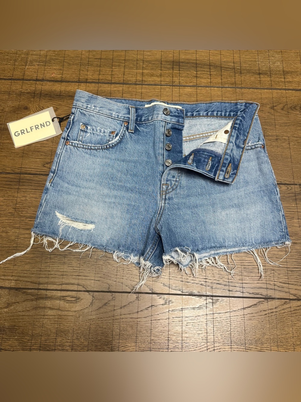 GRLFRND “Hayden” Faded Blue Low-Rise Distressed Denim Cutoffs Size 26 NWT